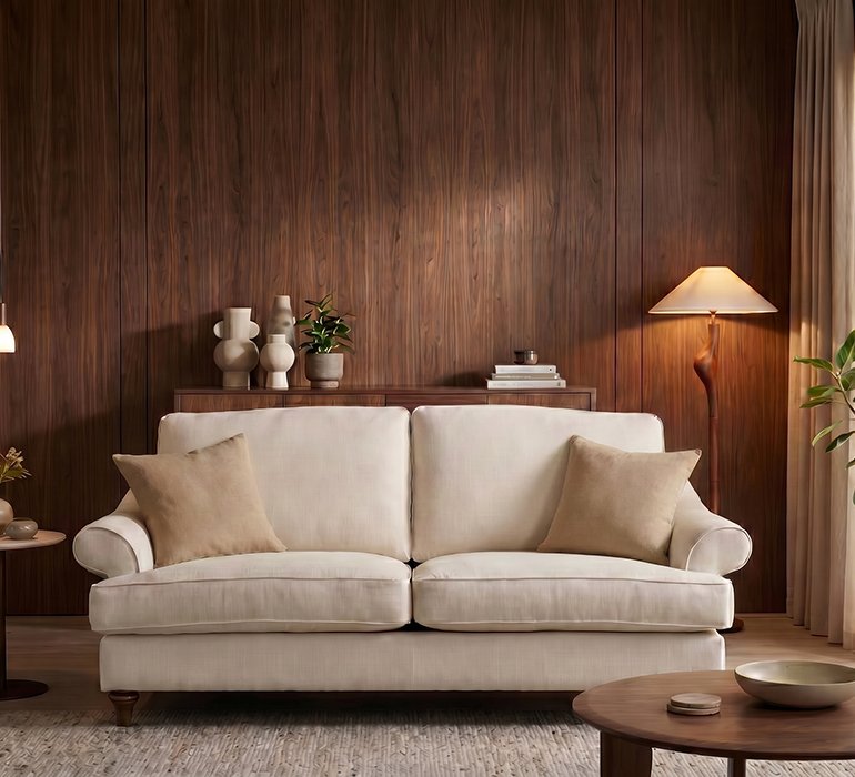 <p>Now in our showroom, crafted with timeless sophistication, Astley embodies enduring elegance and exceptional comfort. Its generously cushioned seat and supportive backrest invite moments of pure relaxation, while softly rolled arms and turned wooden legs lend a touch of classic refinement.</p>
